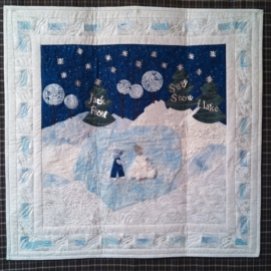 Jack Frost and Suzy Snowflake go skating. I made this for one of the Keepsake Quilting challenges.